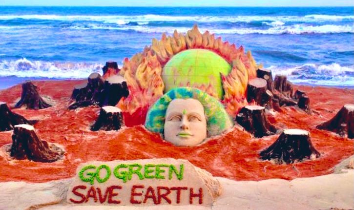 Noted sand artist Sudarsan Pattnaik creates sand art on Earth Day
