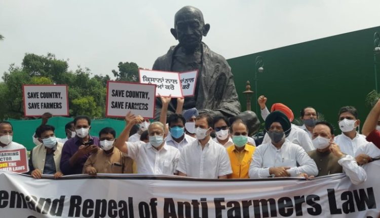 Congress MPs staged a protest in front of Gandhi Statue in the premises of Parliament, over Farm Laws