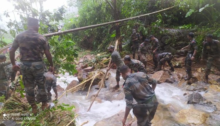 Kerala Flood-Army conducts rescue operations for missing persons in debris in Kavali, Kottayam.