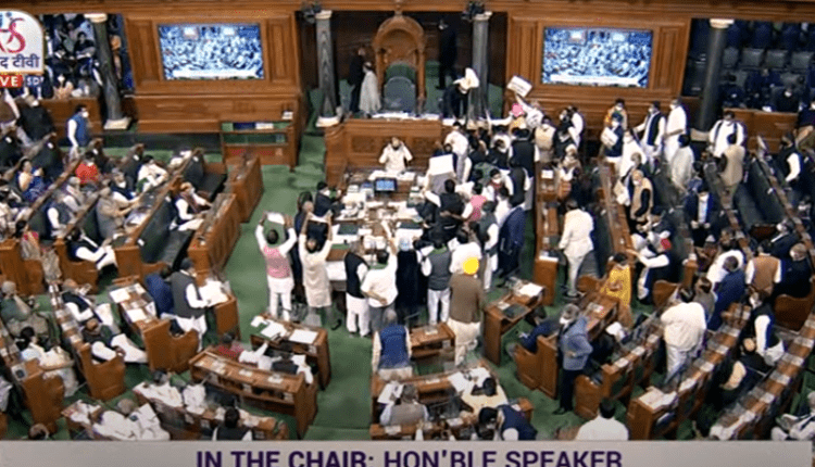Lok Sabha adjourned till 12 noon following sloganeering by Opposition MPs.