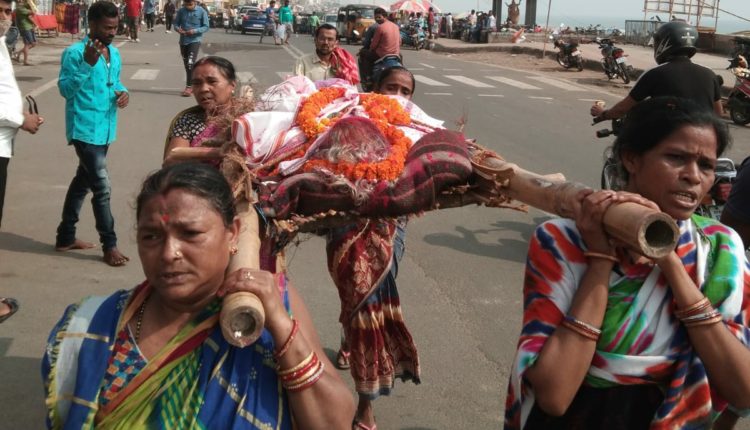 Daughters carry Mother's Bier in Puri