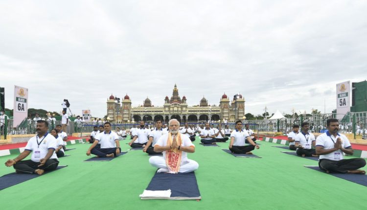 PM Narendra Modi leads Yoga Day celebrations. Indian Armed Forces celebrate yoga at high altitude points.