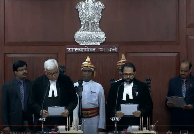 Advocate Sibo Sankar Mishra and Judicial Officer Ananda Chandra Behera take oath as judges of Orissa High Court.