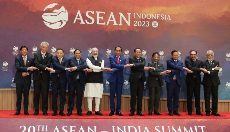 PM Modi, along with ASEAN leaders, poses for a group photo at Association of Southeast Asian Nations (ASEAN) in Jakarta.