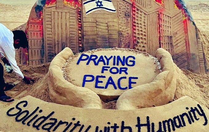 Sand artist Sudarsan Patnaik creates sand sculpture at Puri beach praying for peace amid the ongoing Israel-Palestine conflict.