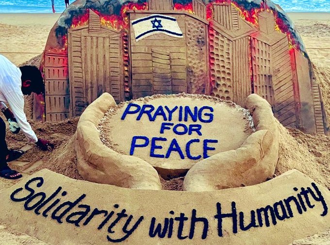Sand artist Sudarsan Patnaik creates sand sculpture at Puri beach praying for peace amid the ongoing Israel-Palestine conflict.