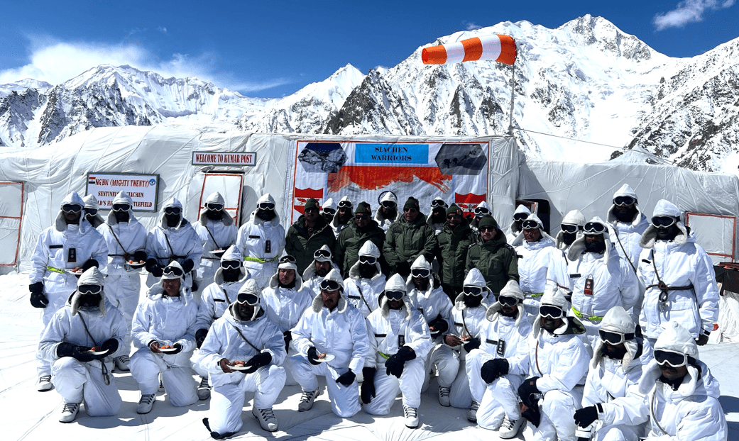 Defence Minister Rajnath Singh interacts with the Armed Forces personnel deployed at Kumar's post of Siachen Glacier in Ladakh.
