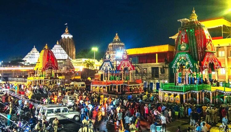 Stage set for grand Ratha Jatra. Servitors of Puri Srimandir performs the ‘Agyan Mala Bije’ rituals for the three chariots.