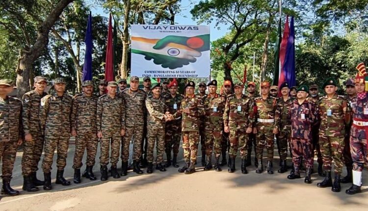 Vijay Diwas: Indian and Bangladesh Army personnel exchange sweets at Agartala-Akhaura border on the occasion of 53rd Anniversary of the Liberation War 1971.