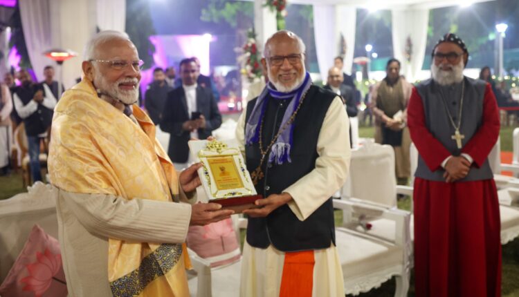 Prime Minister Narendra Modi attends Christmas celebration at the residence of Union Minister George Kurian, in Delhi.