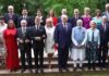 Prime Minister Narendra Modi, other G7 world leaders and invited heads of state stand together for a group photo at the G7 Summit, in Evian, France.